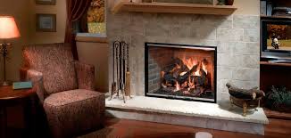 This is the label on the pipe (don't worry we are replacing the duct tape lol) we really want to get a wood stove insert! Heatilator Icon Series Wood Fireplace