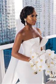 African hair braiding styles are easy and convenient and although in the past they haven't typically been considered your typical african american wedding hair style, nowadays there are some very creative, more formal braided hairstyles that are definitely wedding appropriate. 20 Wedding Updo Hairstyles For Black Brides Trubridal Wedding Blog