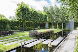 tuin gecombineerd met kunst verbouwing nieuwe achtergevel nieuwe tuin een metamorfose van dit pand en tuin in bodegraven tuin tuin ideeen tuin waterpartijen