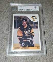 Browse our mario lemieux rookie card checklist and much more. 1985 86 Topps Mario Lemieux Rookie Card Bgs Beckett 8 Nm Mt Ebay