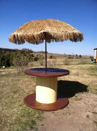 Electrical Spool Made Into A Tiki Table For Permanent Camp Site Campsite Decorating Camping Decor Outdoor
