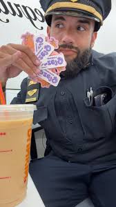 Dunkin' employee gives out stickers to customer