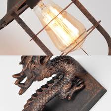 Dragon fire breathing light,3d volcano dragon lamps 3d printed dragon with led warm light, desktop lamp kids sleep accompany night light best gift for boys girls children (ice dragon) 3.9 out of 5 stars. 1 Head Lantern Wall Mount Lamp Industrial Rust Metal Sconce Light With Dragon Backplate For Coffee House Flush Mount Wall Lights