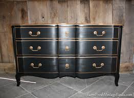 A small french provincial nightstand or side table gets a new look with a little gray paint. French Provincial Dresser Makeover In Black Farm Fresh Vintage Finds