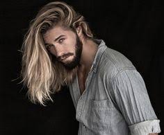 High Contrast Long Blonde Hair And Dark Beard Striking Long Hair Styles Men Mens Hairstyles Long Hair Styles