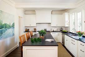 ivory kitchen island with orange