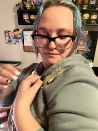 Please grama, can i hold them?? You can see the gentleness in his hands....  Teach them young