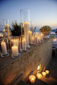 A Must Have On My Big Day Romantic Lighting With Candles And Hurricane Vases Beautiful For Beac Outdoor Wedding Centerpieces Romantic Lighting Wedding Lights