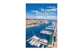 A pontoon system that floats at all times, is separated from a boat pontoon ramp and needs a hinged gangway for access. Marinas Floating Solutions