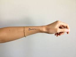 Flowers are one of the simplest of design ideas for wrist tattoos. Bella Pretty Font Wrist Tattoo Design By Pasadya Forearm Tattoo Women Name Tattoos On Wrist Handwriting Tattoos
