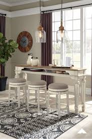 Realyn Chipped White Dining Room Set With Swivel Barstools And Table Counter Height Dining Table Counter Height Dining Room Tables Counter Height Dining Sets