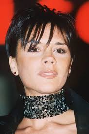 Curly bob haircut with bangs. Victoria Beckham S Hairstyles Colours Bob Lob The Pob And Extensions Glamour Uk