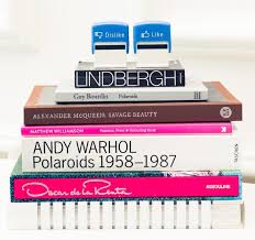 It looks like a clean minimalist slate with a nicely curated and culturally diverse selection of coffee table books. Meet The Man Behind Your Next Designer Shoe Sale Score Fashion Coffee Table Books Guy Bourdin Books