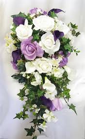 Wedding bouquets lavender silver white. Natural Touch Off White Purple And Lavender Roses Orchids And Callas Cascade Bouquet Purple Wedding Bouquets Flower Bouquet Wedding Wedding Bouquets