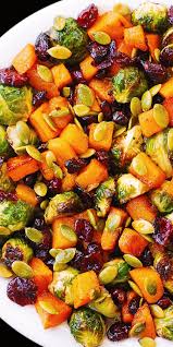Join us for an international holiday feast, as anglophenia's kate arnell takes a look at several traditional christmas dishes from around the world. Roasted Brussels Sprouts Salad With Maple Butternut Squash Pumpkin Seeds And Cranberries Whole Food Recipes Veggie Dishes Vegetable Dishes