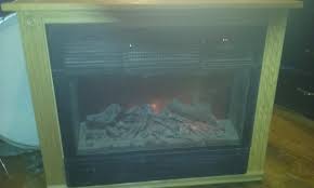 Ainfox small electric fireplace heater embedded stove heater space heater with remote control realistic flame effect 1500w black. Heat Surge Electric Fireplace Nex Tech Classifieds