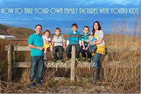 How To Take Your Own Family Pictures With Young Kids Keeping It Simple Family Picture Poses Family Photo Pose Pictures