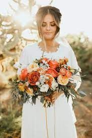 Jj's house offers tons of affordable wedding flowers and wedding bouquets in a variety of materials, such as silk wedding flowers and satin ones. Fall In The Middle Of Summer With These 2 Beauties Photo Chasesevey Orange Wedding Flowers Fall Wedding Bouquets Rusting Wedding