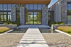 Water Rills Pour Into A Reflecting Pool Traversed By Stone Pavers At Entrance Reflecting Pool Highland Homes Farmhouse Landscaping
