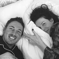 Dave Gardner and Liv Tyler hold hands with his son Gray