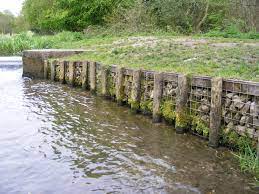 See more ideas about retaining wall, landscaping retaining walls, backyard landscaping. Rock Fall Netting And Gabion Stone Willowbank Sloped Backyard Landscaping Stone Walls Garden Sloped Garden