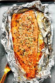 Baked Salmon In Foil With Garlic Rosemary And Thyme Whole30 Keto Recipe Trout Fillet Recipes Cooking Trout Baked Trout