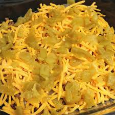 Take a strip of cheese and insert it into each chili. Chile Rellenos Casserole