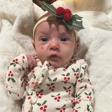 tis the season of scarlett. 🎄 having a newborn during the holiday season  was both challenging & magical. incredibly grateful for everyone who loved  & supported us through the 4th trimester. babies