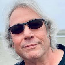 Who wrote this? It's missing ALL caps, tyPoS and has proper grammar.  Something is off...