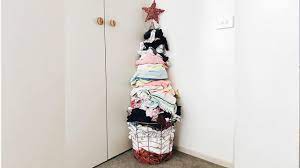 Check spelling or type a new query. This Mom S Christmas Tree Made Of Laundry Is The Most Relatable Holiday Decor Ever Fox 46 Charlotte