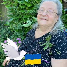 What can I plant under my cherry laurel and conifer? I'm in the UK.