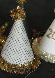 23 Sparkly Nye Hats Headbands To Diy This Weekend New Year S Eve Hats Nye Hats New Years Eve