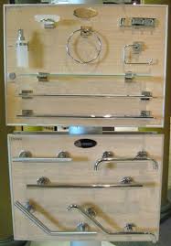 Keep your bathroom tidy with modern bathroom accessories. Bathroom Hardware Accessories Showroom Decor Showroom Interior Design Design Center Showroom