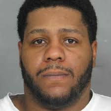 Husband of woman found dead charged in Omro double homicide