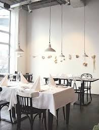 Laurier In Paris Paint Dipped Black Chair With White Top With Images Painted Chairs Restaurant Design Bar Restaurant Interior