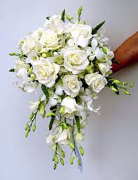 08 of 30 make an impact All White Cascade Bouquet With Roses And Dendrobium Orchids Cascading Wedding Bouquets Flower Bouquet Wedding Small Wedding Bouquets