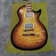 Plastic shopping bag 14.96 x 13.38 x 5.91 inch; Rachel Howard S Crochet Gibson Guitar Blanket Is Bonkers Brilliant Knithacker