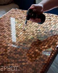This table is handmade with live edge ash accented with copper epoxy. Copper Creativity Diy Penny Desk That Steals The Show
