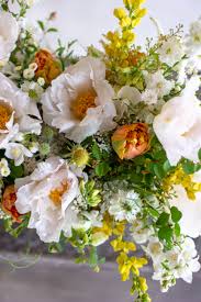 Check out our favorite yellow and orange wedding flowers, from boutonnières and bouquets to centerpieces. Yellow White And Orange Wedding Flowers Orange Wedding Flowers Wedding Flowers Spring Wedding Flowers