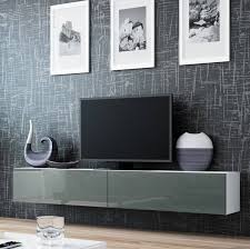 One shelf and two gun metal gray pipe brackets (the photo has two shelves as a representation of how two shelves will appear on the wall). 17 Different Types Of Floating Shelves For Tvs Home Stratosphere