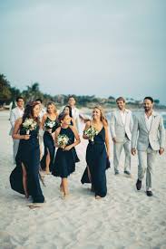 Bridesmaids In Blue Groomsmen In Grey Beach Bridesmaid Dresses Beach Bridesmaids Wedding Bridesmaids