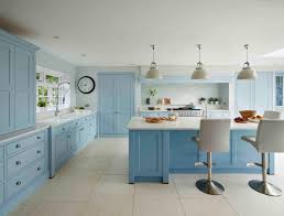 I adore a center island that makes a statement and this beautiful kitchen from design 4 corners does just that! Beautiful Blue Kitchens The English Home
