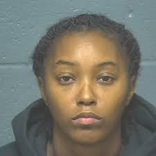 Woman charged with assault after shooting in Bricktown parking lot