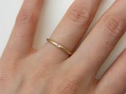 Go with a contoured ring. A Cup Of Jo An Ultra Simple Wedding Ring With A Just A Bit Of Sparkle Glamour