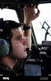 Capt. Steve Quinn, 3d Airlift Squadron Reach 7170 aircraft commander, goes  through pre-flight procedures in a C-17 Globemaster III before taking off  at Fort Carson, Col. Sep. 26, 2017. Reach 7170 is transporting essential  recovery equipment from the 68th ...
