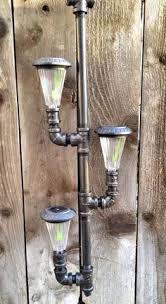 Solar Powered Outdoor Chandelier Pendant Lighting Made Out Of Iron Pipes Solarleuchten Garten Outdoor Kronleuchter Und Licht Im Garten