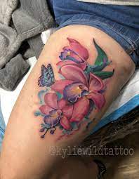 Pink Orchids And Blue Butterfly Thigh Tattoo In Watercolour Style By Kylie Wild Heslop Canberra Austr Leg Tattoos Women Butterfly Thigh Tattoo Tattoo Artists