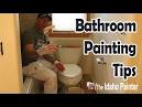 How do you paint behind a toilet