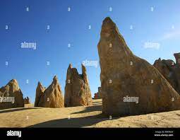 Pinnacles desert standing stones in Nambung National Park near Cervantes in  Western Australia Stock Photo - Alamy