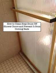 How To Clean Soap Scum Off Shower Doors Using A Paste Of Baking Soda White Vinegar Let Sit For 15 Min Clean Shower Doors Cleaning Shower Glass Shower Doors